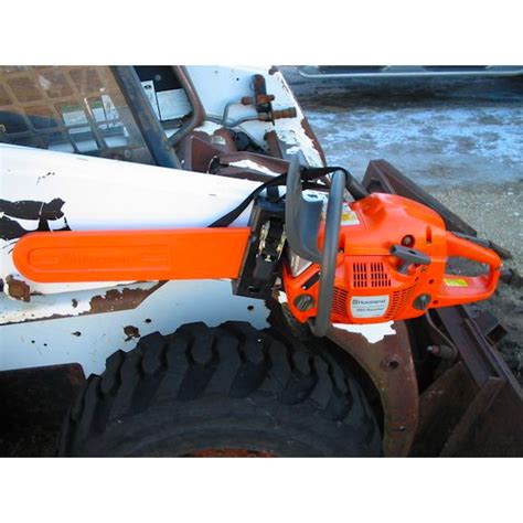 skid steer chainsaw holder|large hydraulic chainsaw skid steer.